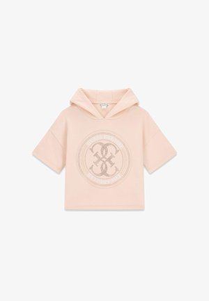 Halvány rózsaszín, rövid ujjú, crop felső kapucnis pulóver, elöl perforált kör alakú logóval és a "Guess Est. 1981 Los Angeles" felirattal.