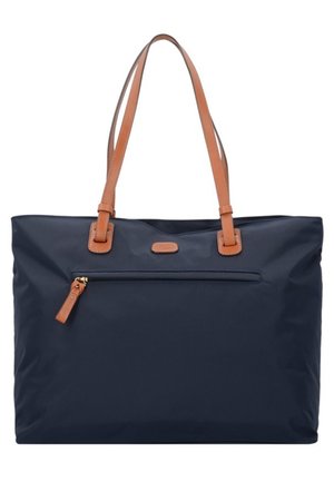 Navy blue tote bag with brown leather handles and a front zippered pocket, designed for everyday use.