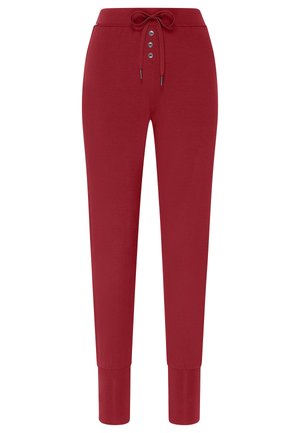 Rote Baumwoll-Jogginghosen mit elastischem Bund, Kordelzug, vier Knöpfen und gerippten Knöcheln. Glatte Textur und taillierte Passform.