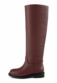 Burgundy leather knee-high boot with textured finish, round toe, minimal detailing, and black rubber sole. Smooth upper and sturdy construction.