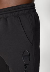 Champion ICONS TONAL CUFF LARGE LOGO - Tracksuit bottoms - black