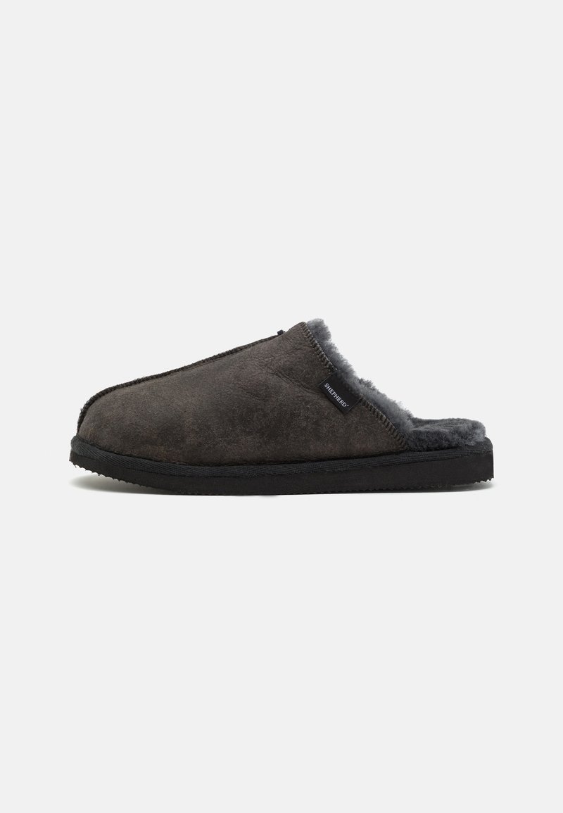Dark gray suede slip-on slipper with black sole and soft gray fleece lining, viewed from the side against a white background.