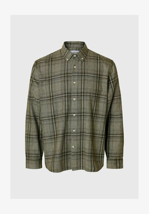 Roheline ruuduline särk, millel on kaelus, pikad varrukad ja mugav lõige. Omab peeneid musti ja halli jooni pehmest kangast.