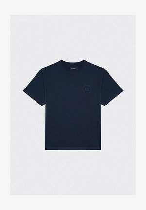 Dark navy blue t-shirt made of fabric, featuring a crew neck, short sleeves, and a circular logo print in a lighter shade on the chest.