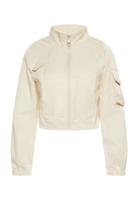 Giacca corta in tessuto crema con colletto alto, zip frontale e tasche laterali. Presenta polsini elastici e un design minimalista.