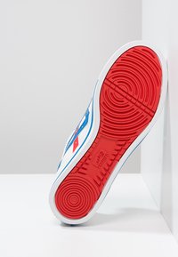 onitsuka tiger aaron