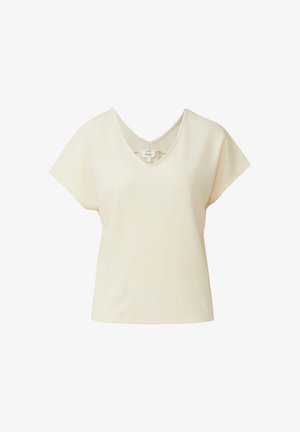 Cream-colored short-sleeve V-neck blouse made of textured fabric with a relaxed fit.