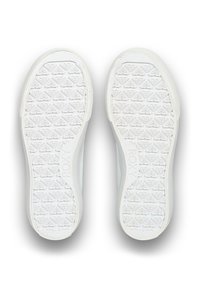 White sneaker soles with repeating heart-shaped patterns and "ROXY" brand name embossed on the arch area.