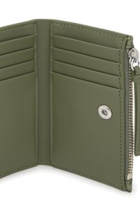 Green leather wallet features multiple card slots, a zippered compartment, and silver hardware with a snap closure. Smooth texture throughout.