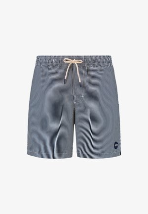 Tumedad sinine ujumispüksid valgete vertikaalsete triipudega, elastne vöökoht, reguleeritav nöör ja väike logo alumisel küljel.