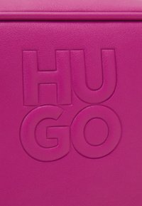 HUGO CROSSBODY  - Torba preko tijela - dark pink