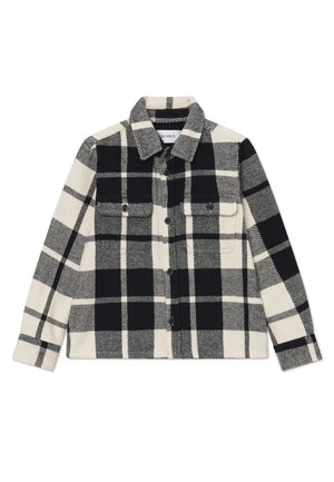 Black and white plaid flannel shirt with two chest pockets, button closure, and a collared neck. Soft texture and structured shape.