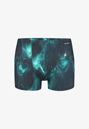 Miesten bokserishortsit, joissa on teal- ja musta abstrakti kiemurakuvio sekä pieni "olaf benz" -merkintä vyötärönauhassa.
