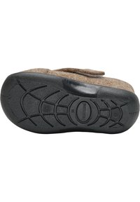 Brun filttoffel med texturerad svart gummisula med en böjd design och en Hummel-logotyp, som ger hållbart grepp och bra fäste.