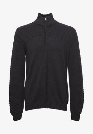 Schwarzer gestrickter Zip-Up-Pullover mit strukturierten Mustern an Schultern und Ärmeln, gerippten Bündchen und Saum, hohem Kragen und silbernem Reißverschluss.