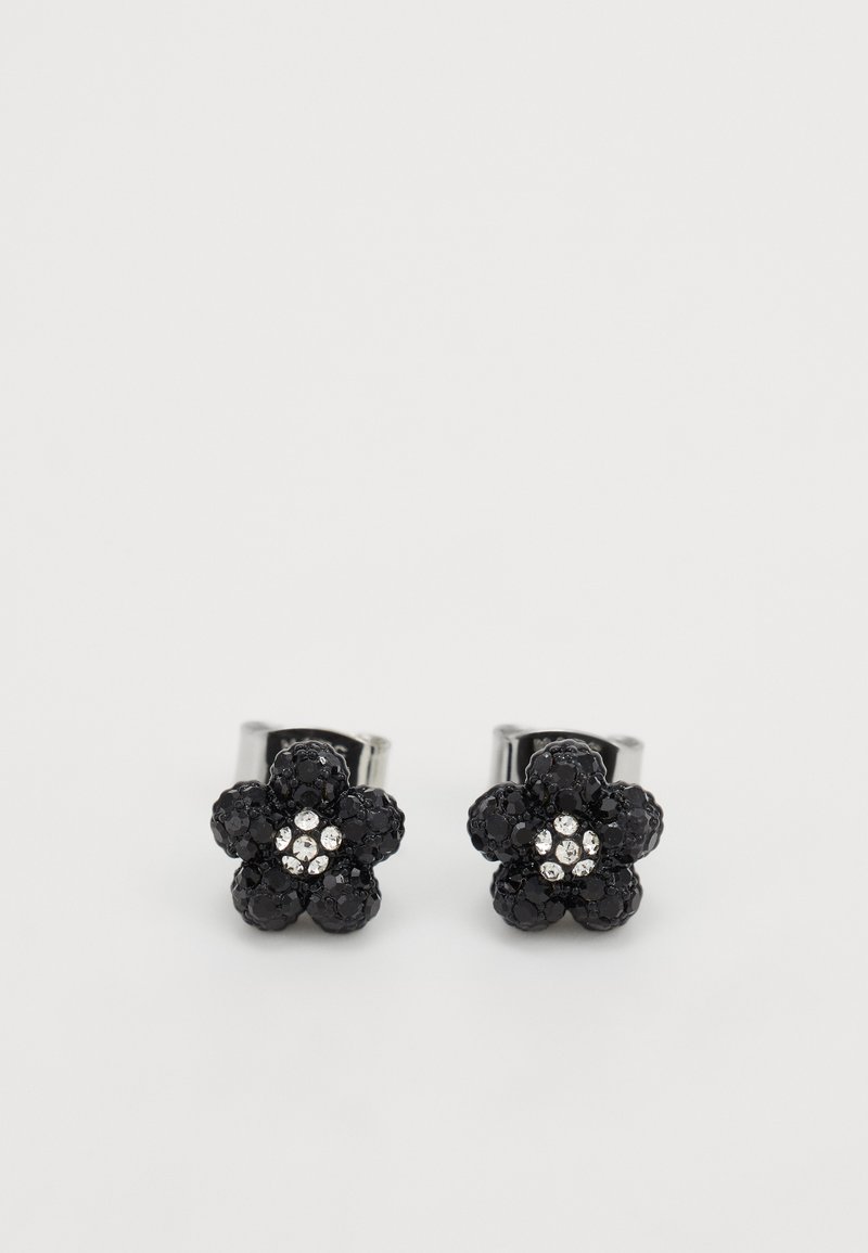 Black floral earrings with a glossy texture, featuring crystal accents in the center. Metal hardware with a shiny finish.