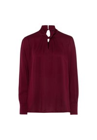 Blouse bordeaux à manches longues avec un col haut, mettant en valeur un détail en forme de trou de serrure et des plis sur la poitrine. Tissu lisse et léger.