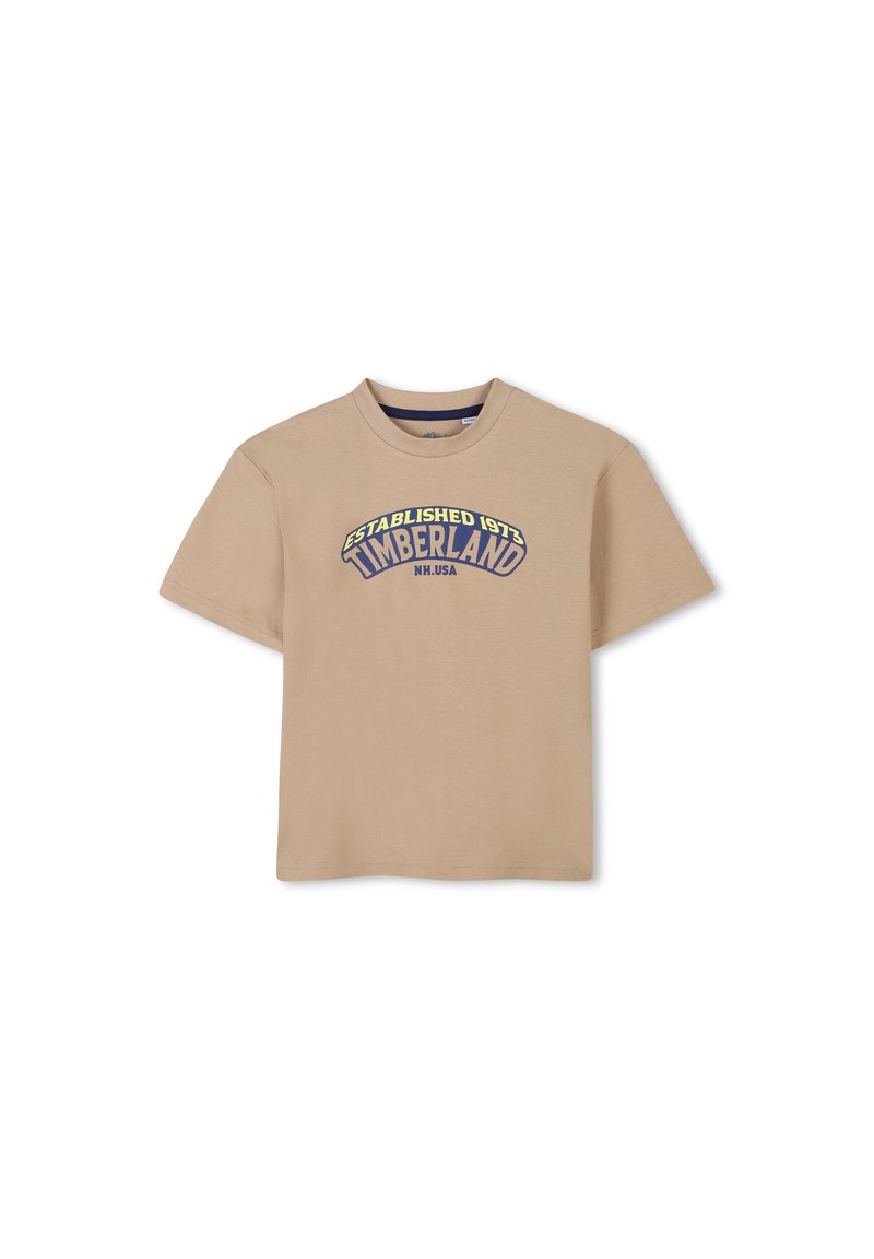 Beige katoenen t-shirt met een ronde halslijn en korte mouwen, voorzien van een kleurrijk Timberland-logo en tekst gecentreerd op de voorkant.