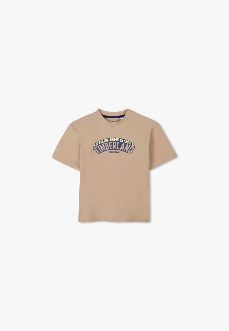 Beige katoenen t-shirt met een ronde halslijn en korte mouwen, voorzien van een kleurrijk Timberland-logo en tekst gecentreerd op de voorkant.