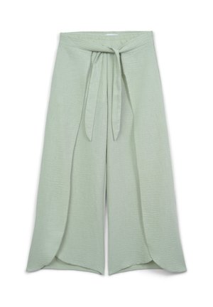 Pantaloni ampi verde chiaro realizzati in tessuto testurizzato. Presentano una vita con lacci e un design sovrapposto, con orli a campana e una vestibilità morbida.