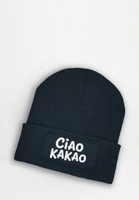 Navy knit beanie with a folded cuff. Features a rectangular patch with "Ciao Kakao" in bold white text. Textured ribbed fabric.