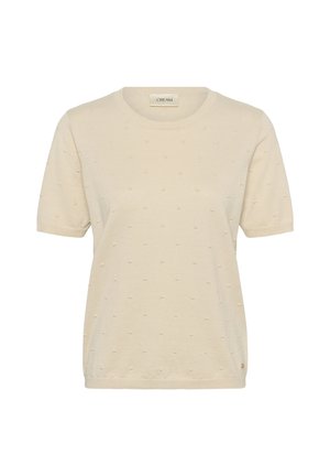 Haut en tricot à manches courtes de couleur crème avec un motif subtil de points surélevés, encolure ronde et poignets côtelés.