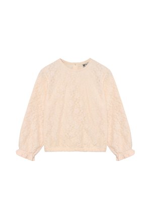 Lyserød bluse med lange ærmer med blomstret blondeoverlay og flæsekant ved ærmerne, rund halsudskæring og knaplukning bagpå.