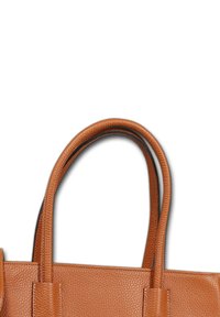 Bruine leren tote bag met gestructureerd ontwerp en twee ronde handvatten. Heeft zichtbare stiksels en versterkte bevestigingspunten aan de zijkanten.