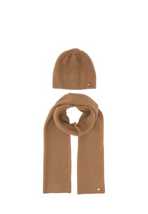 Brown knitted winter hat and matching scarf with a textured pattern, displayed on a white background.
