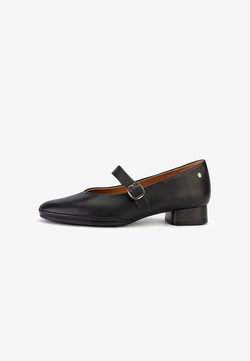 Chaussure Mary Jane en cuir noir avec talon bloc bas et bride réglable avec boucle, vue de côté sur fond blanc.