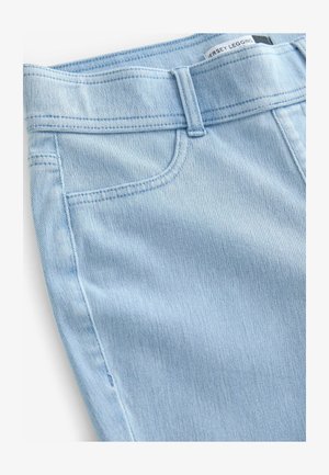 Legging en jersey bleu clair avec une texture lisse et douce, comportant une ceinture, des passants de ceinture et des poches avant.