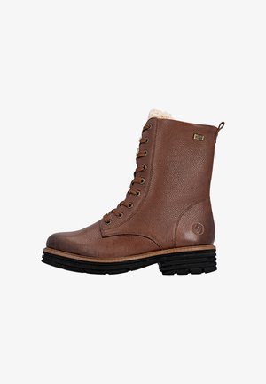 Braune Lederstiefel bis zum Knie mit Kunstfellfutter, runder Schuhspitze und schwarzer Gummisohle. Verfügt über Metallösen und Schnürverschluss.