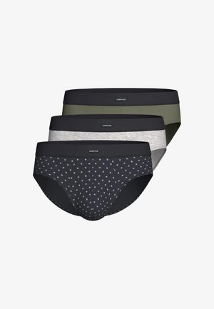 Drei Herren-Slips in Schwarz mit weißen Punkten, einfarbig hellgrau und einfarbig olivgrün, jeweils mit einem schwarzen Bund mit der Aufschrift „IMPETUS“.
