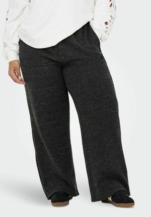 Pantalons large en gris charbon, fabriqués dans un tissu tricoté texturé avec une taille élastique, offrant une coupe décontractée et un subtil relief.
