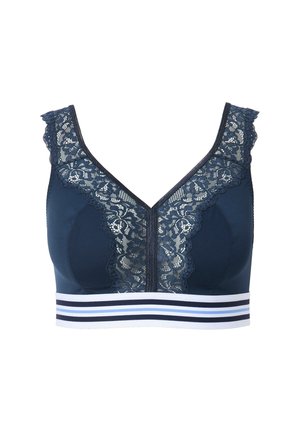 Soutien-gorge de sport bleu marine avec une bordure en dentelle le long de l'encolure et une fermeture éclair à l'avant. Présente une bande rayée de couleurs blanche et bleue.