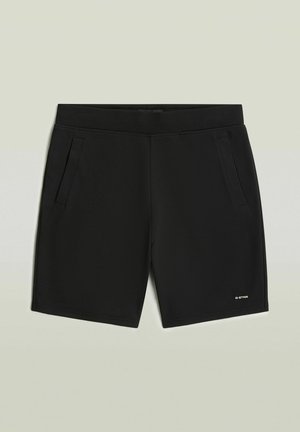 Pantaloncini neri con texture, vita elastica, due tasche laterali e piccolo logo bianco G-STAR sulla parte inferiore della gamba destra.