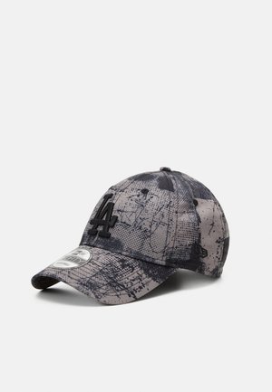 Baseball cap with black and gray abstract pattern, black "LA" logo on front, and curved brim, placed against a white background.