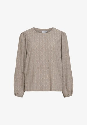 Beżowa bluzka z długim rękawem wykonana z teksturowanej tkaniny, z diamentowym wzorem z wycięciami, okrągłym dekoltem i marszczonymi rękawami.