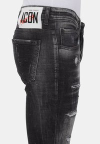 Local Fanatic PAINT SPLATTER DESTROY STOASH - Jeans Skinny Fit - zwart