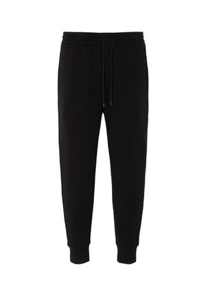 Pantaloni della tuta neri realizzati in tessuto morbido, con vita elastica e cordino, orli a costine e senza motivi o decorazioni visibili.