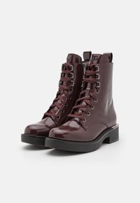 DKNY Stivaletti con plateau - bordeaux
