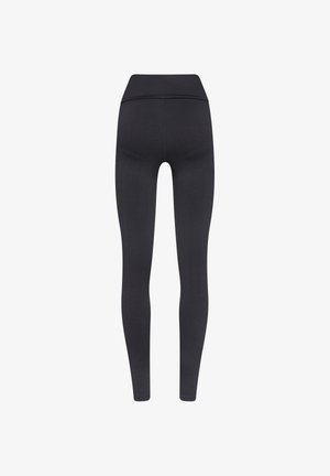 Legging neri con motivo ondulato e testurizzato. Design a vita alta, forma aderente e tessuto liscio adatto per abbigliamento sportivo.
