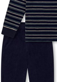 Langärmliges navy-blaues Oberteil mit horizontalen Streifen in Hellblau und Creme, kombiniert mit passenden navy-blauen Sweatpants aus weichem Stoff.