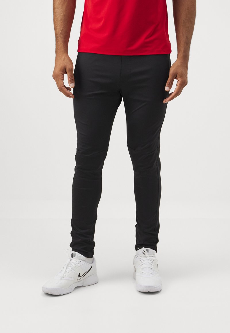 Björn Borg TRAINING PANTS - Pantalones deportivos - black beauty