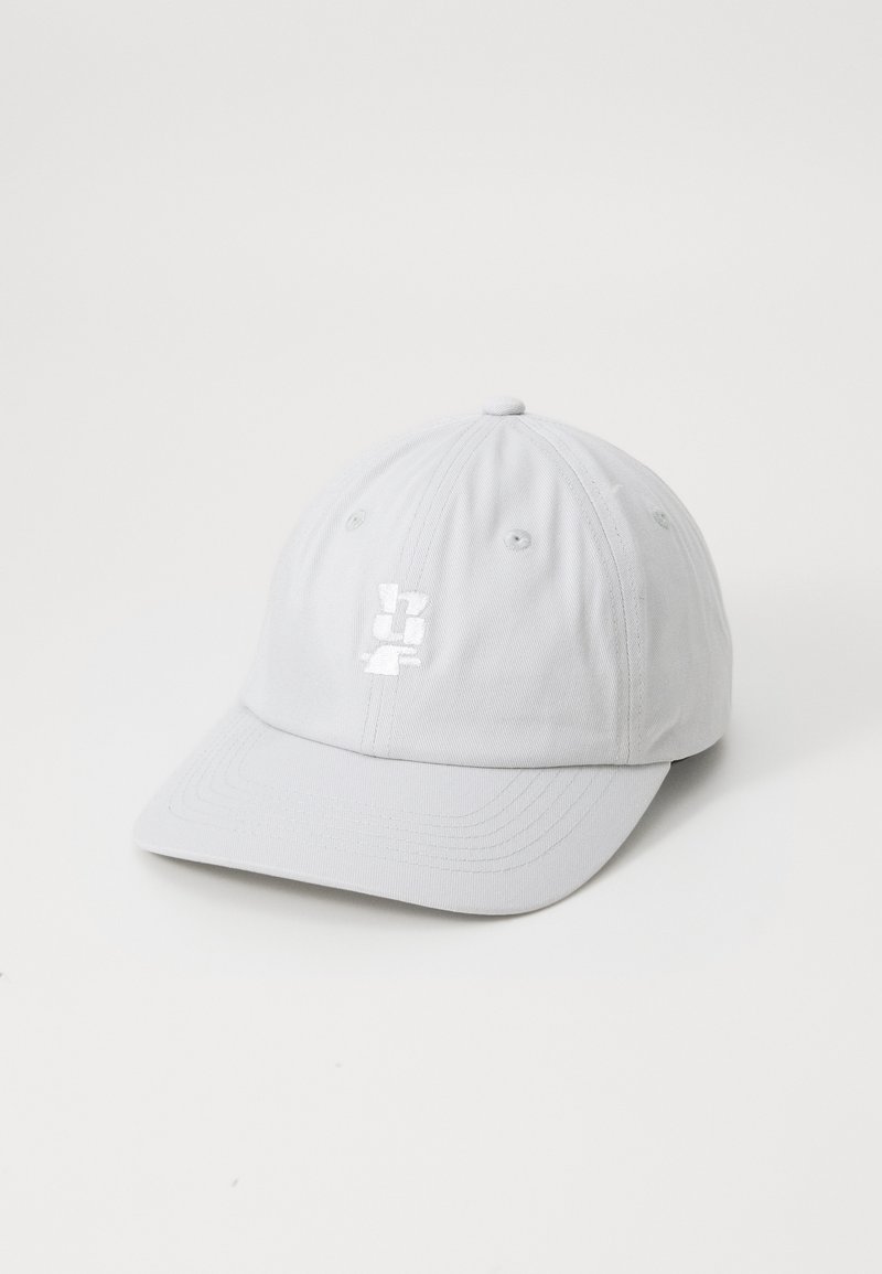 Gray cotton cap with a curved brim. Features embroidered logo in white at the front, six-panel design, and ventilation eyelets.