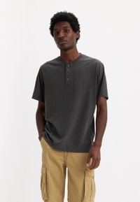 Levi's® BUTTON HENLEY - Základné tričko - black oyster