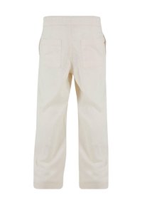 Ljust beige byxor med en avslappnad passform, utrustade med ett elastiskt midjeband, två bakfickor och en slät textur. Enkelt design utan mönster.