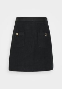 Zwarte rok van gestructureerde stof, met een getailleerde taille, twee voorzakken met goudkleurige details en een rechte zoom.