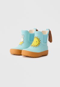 Bottes en caoutchouc bleues imperméables avec des semelles texturées en tan. Présentent un design de lapin et de soleil sur le devant, des côtés élastiques et des poignées pour un enfilage facile.