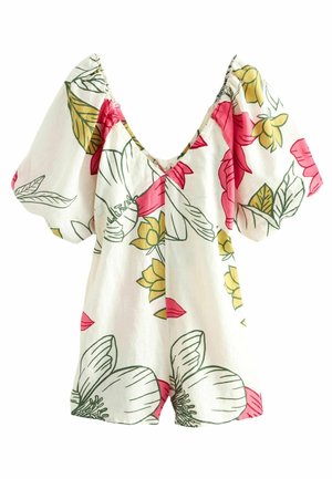 Valkoinen haalari, jossa suuri vaaleanpunainen ja keltainen kukkakuvio, syvä V-pääntie ja liehuvat lyhyet hihat.